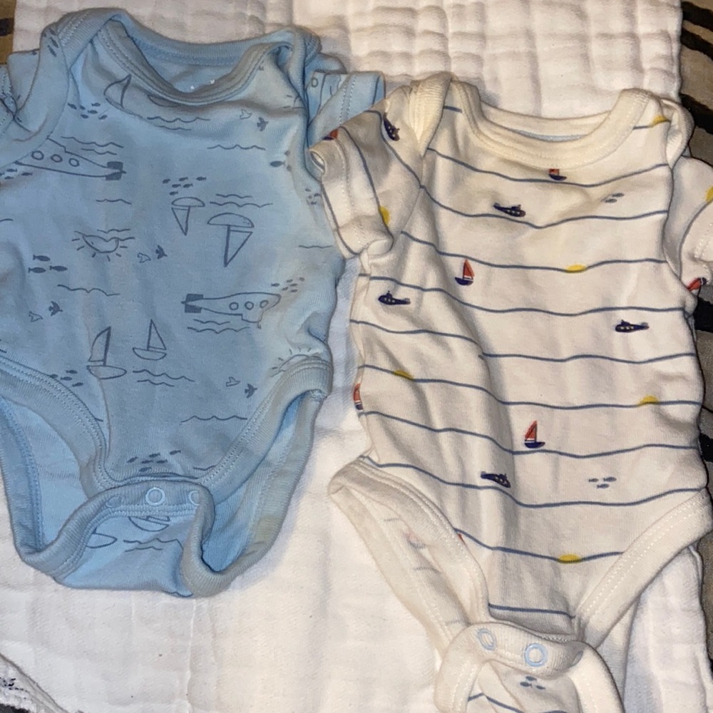 Baby Boy shirts gently used size NB
